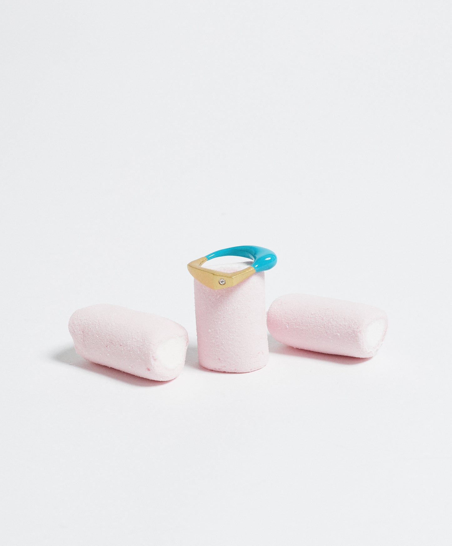 Matt gold plated recycled brass and hand painted enamel, with signature crystal.